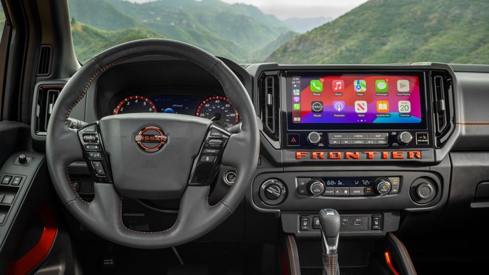 Front row view of the infotainment center inside the Nissan Frontier.